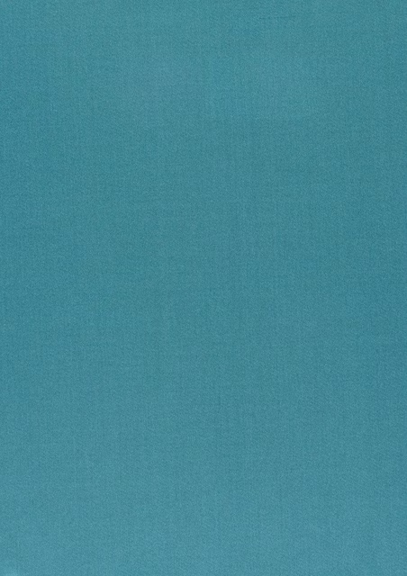 Close-up of cool mineral blue teal fabric with a fine plain weave
