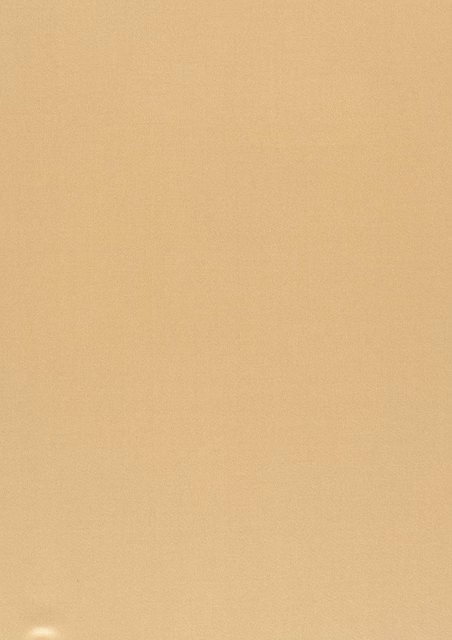 Close-up of smooth pale gold fabric with a softly lustrous, even weave