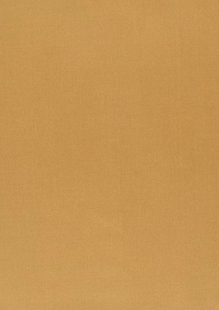 Close view of warm gold textile showing a fine, subtly textured plain weave