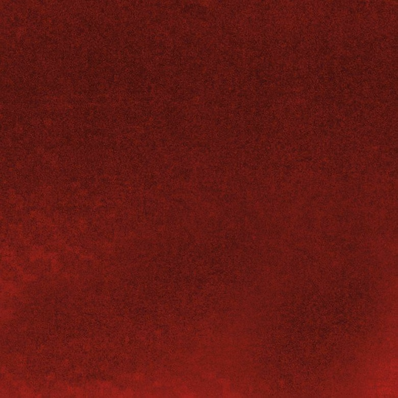 Deep spice-red fabric with subtle mottled shading and a soft, low-lit surface