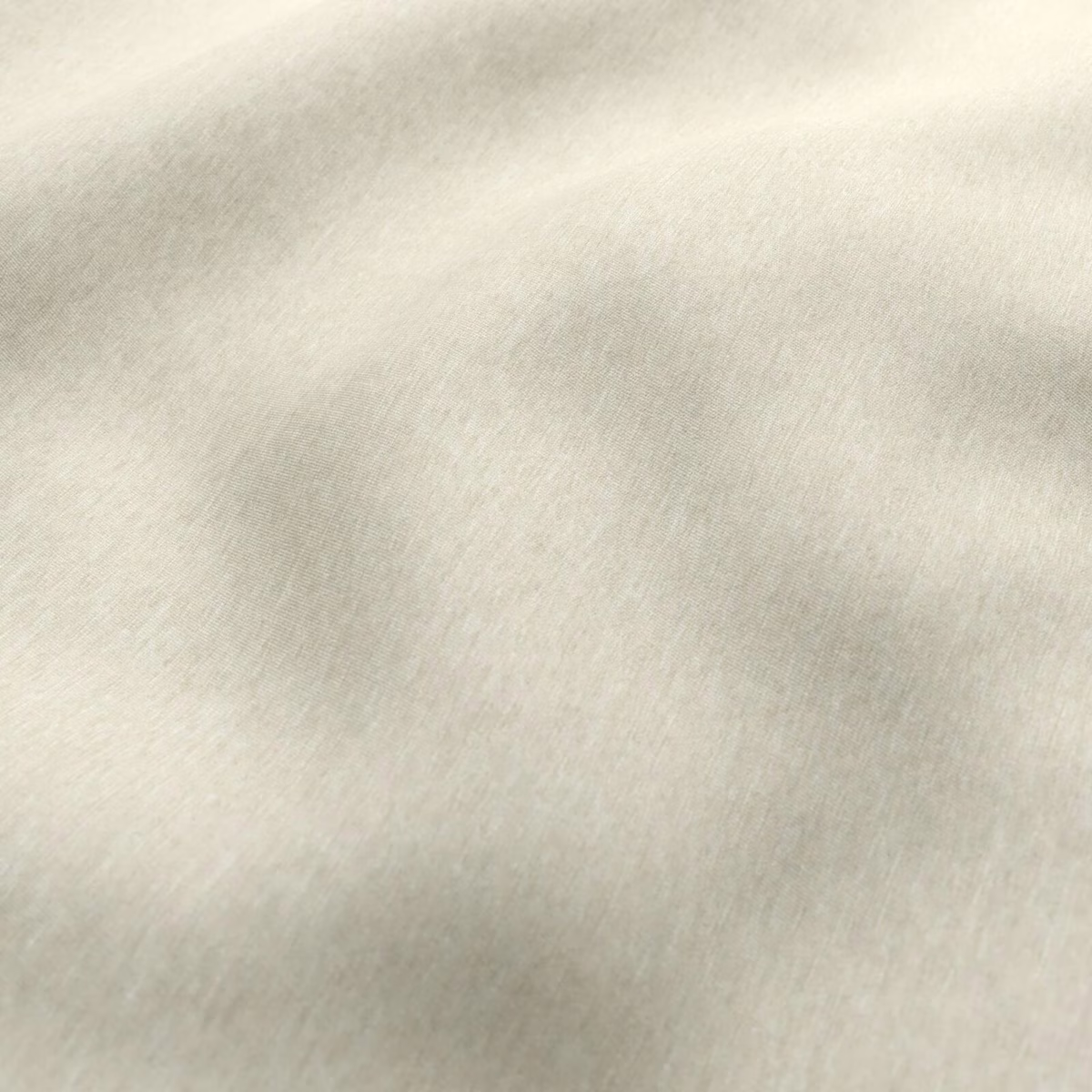 Pale cane-beige fabric with softly mottled, fine woven tonal texture
