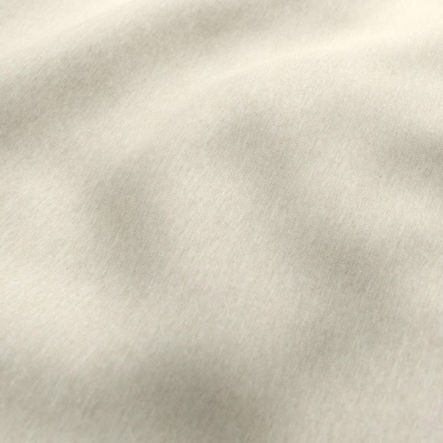 Pale cane-beige fabric with softly mottled, fine woven tonal texture