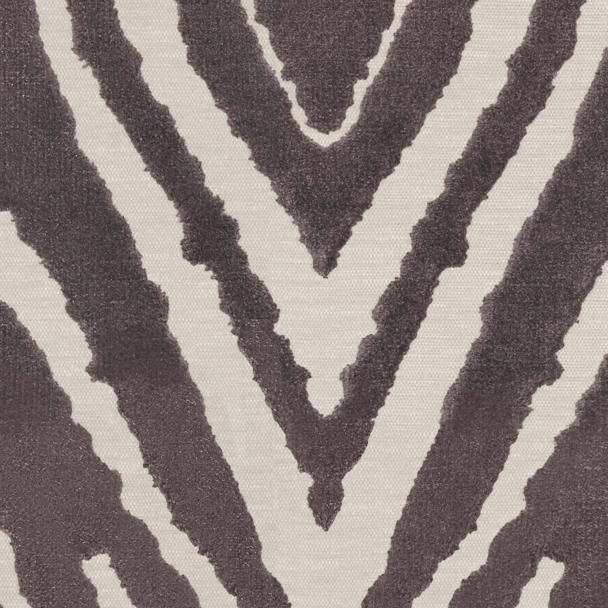 Fog grey woven fabric with raised charcoal branching zebra-like stripes