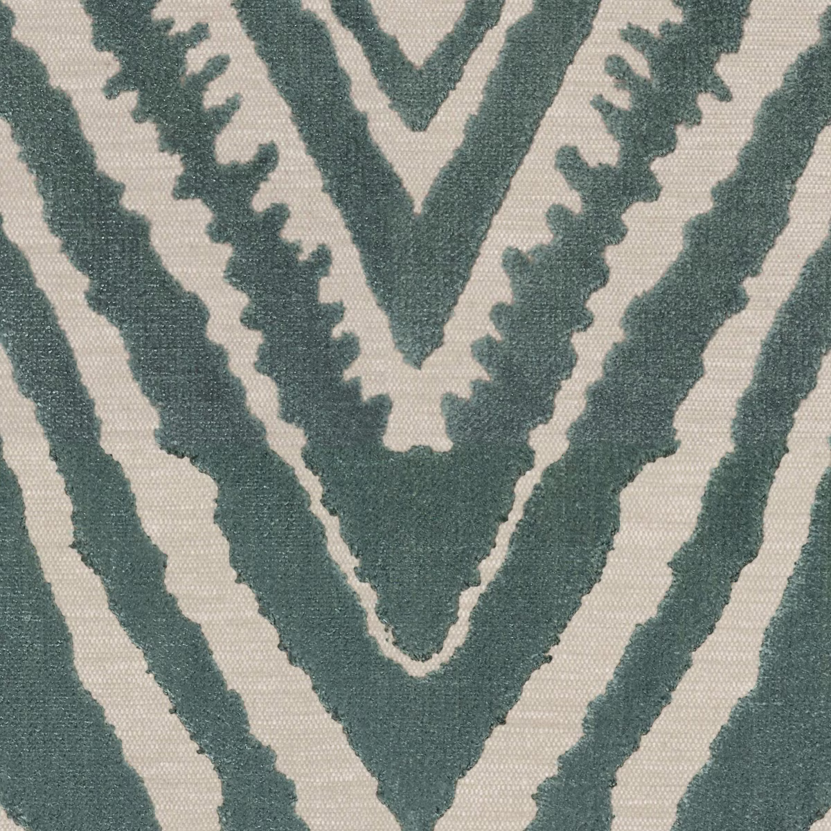 Muted blue-green geometric Deco weave on a warm cream fabric ground