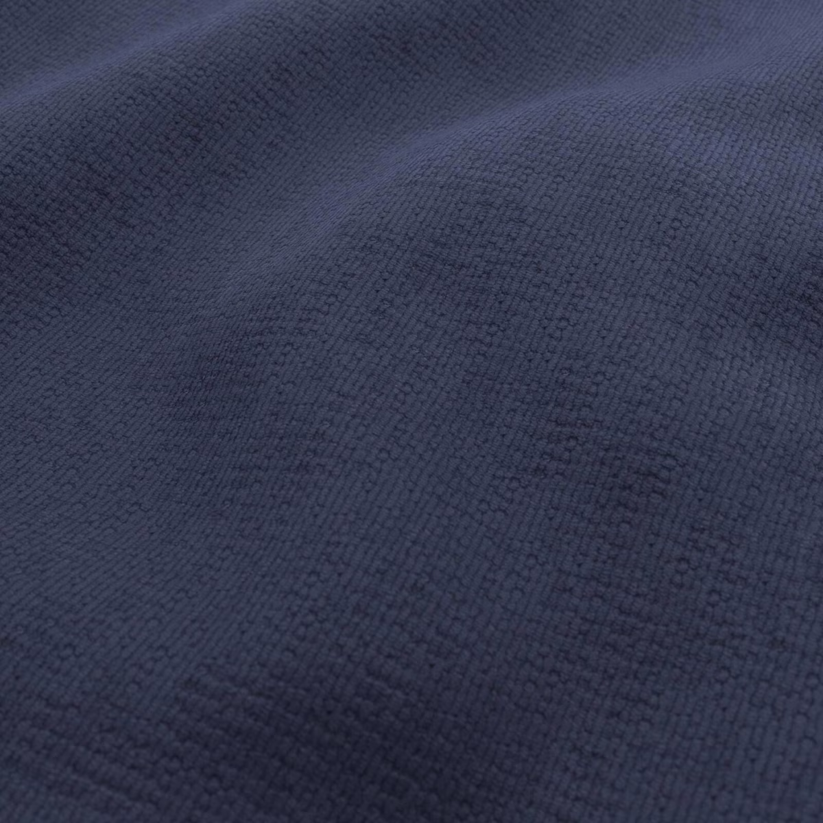 Deep navy Dream fabric with a fine, raised woven texture in close view