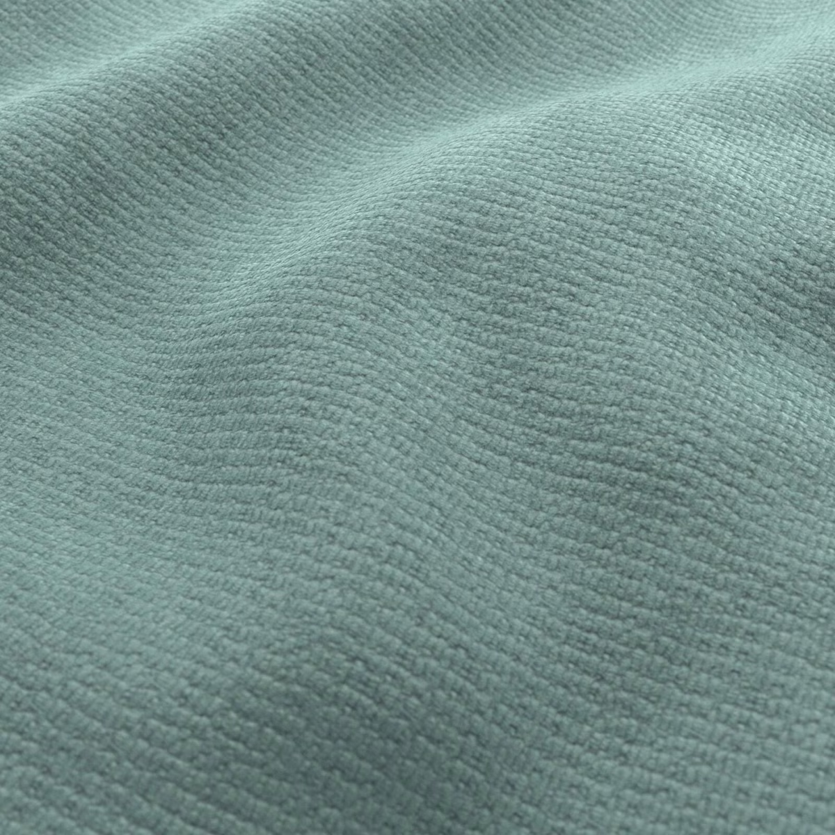 Close-up of cool turquoise woven fabric with softly rippled nubby texture