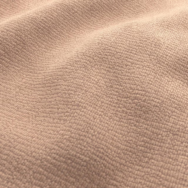 Warm rose-taupe fabric with a fine rippled, nubby woven texture