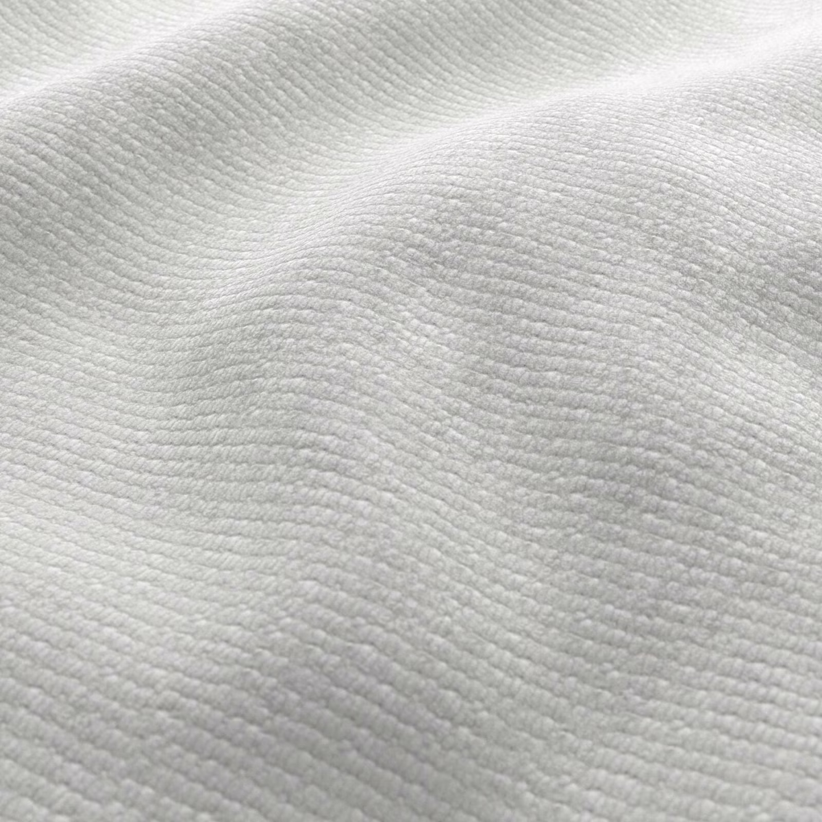 Near-white cream fabric with fine curved ribs and softly shaded woven texture