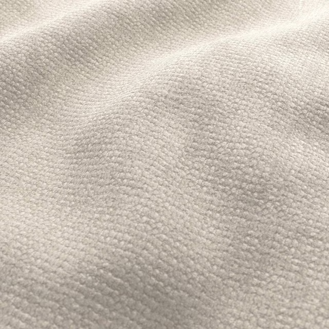 Close-up of pale greige Stardust fabric showing a softly ridged nubby weave