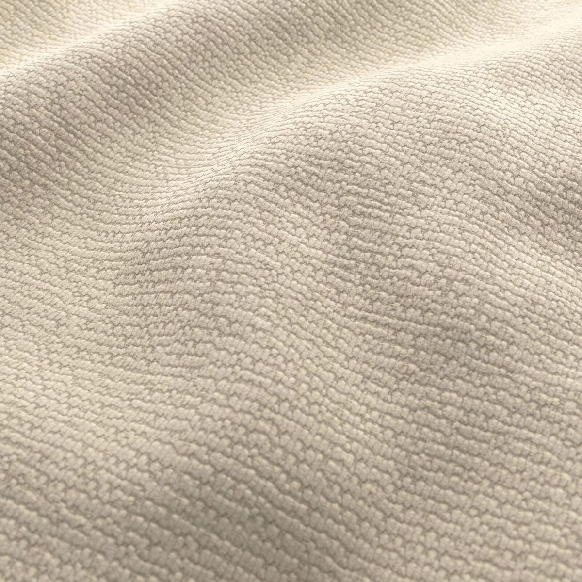 Close-up of warm dune-beige looped texture with softly rippled tonal shading