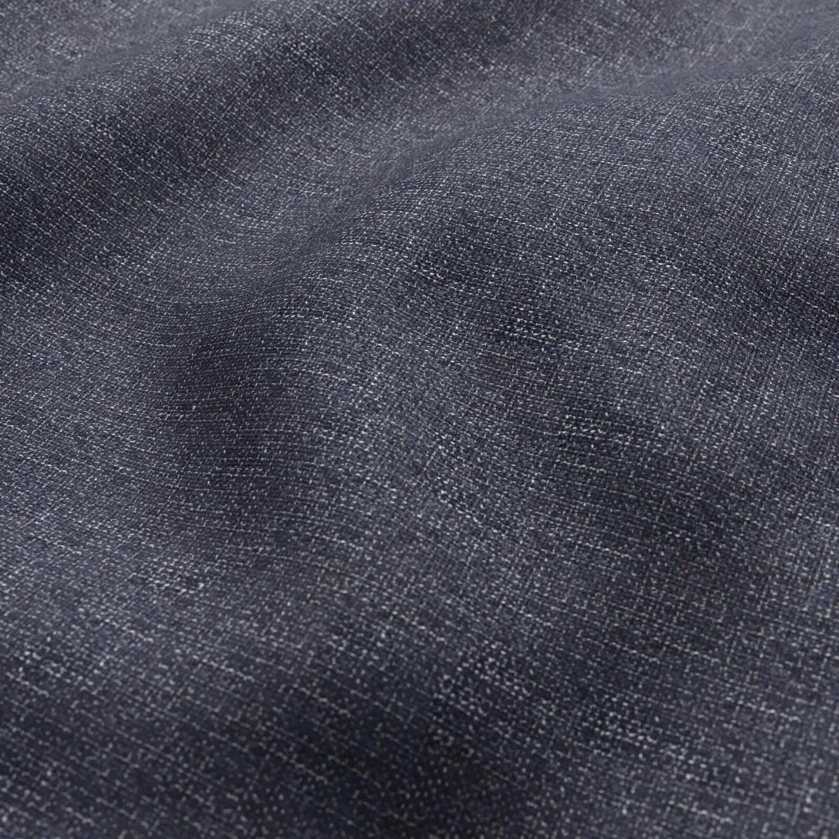 Charcoal-grey woven textile with blue-slate flecks and a softly mottled texture