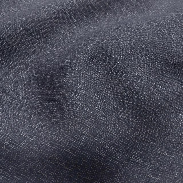 Charcoal-grey woven textile with blue-slate flecks and a softly mottled texture