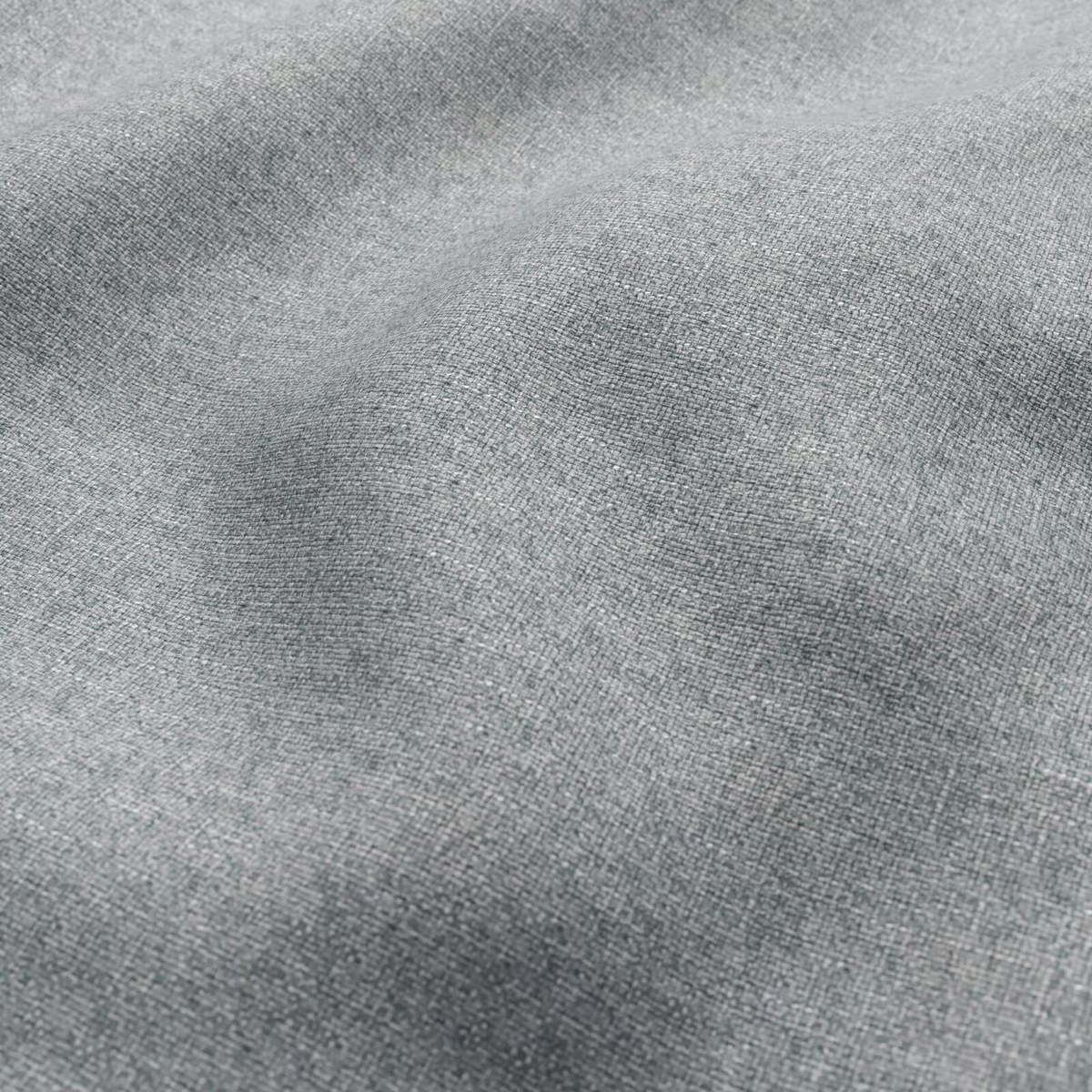 Close view of mottled grey-green lichen fabric with a fine woven texture