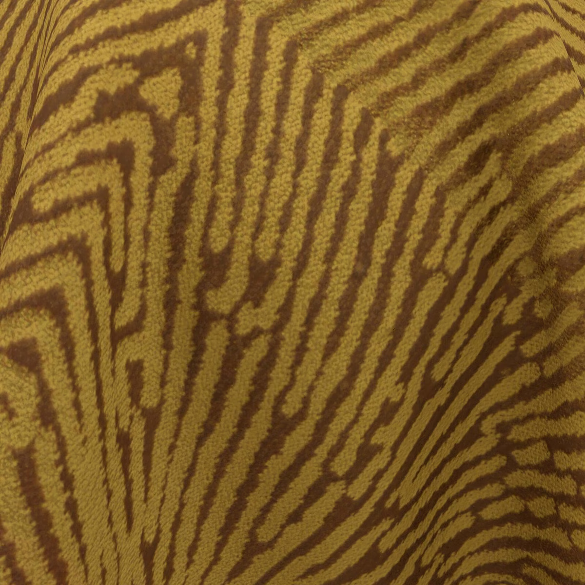 Close-up of brass fabric with raised olive-brown organic stripe markings