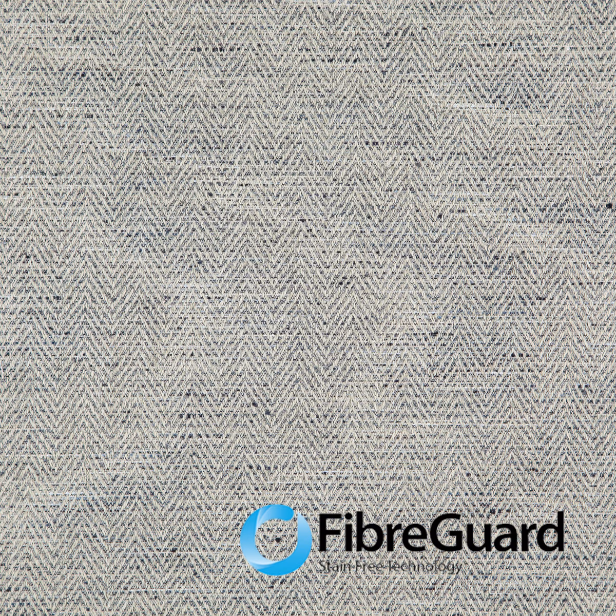 Pale greige woven herringbone fabric with fine grey flecks and textured surface