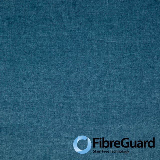 Close-up of cool denim-blue teal fabric with softly mottled woven texture