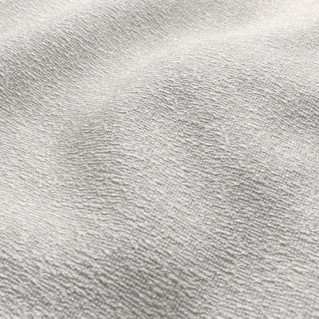 Pale warm-grey Fuzzy fabric with softly rippled directional texture and shaded ridges