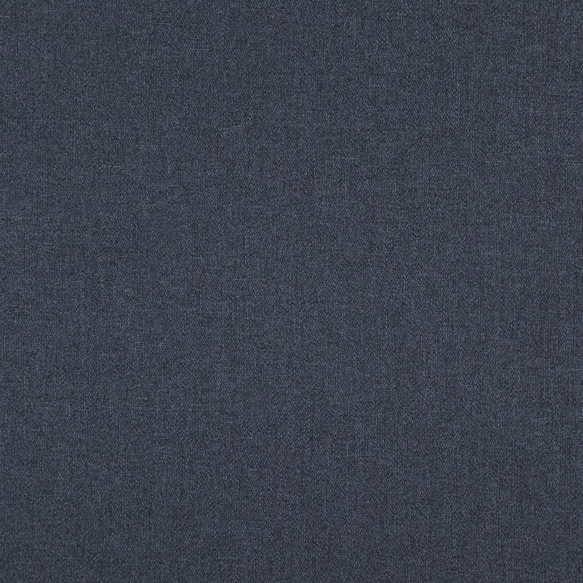 Close-up of deep indigo fabric with a fine, subtly mottled woven surface