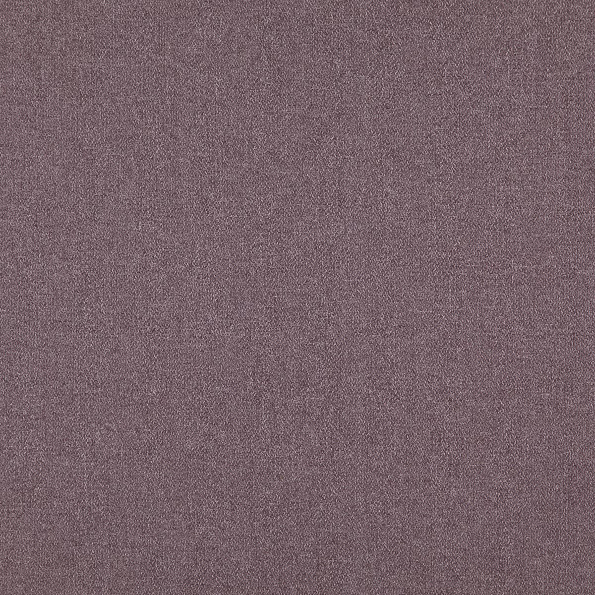 Close-up of dusty amethyst mauve fabric with a fine softly mottled weave