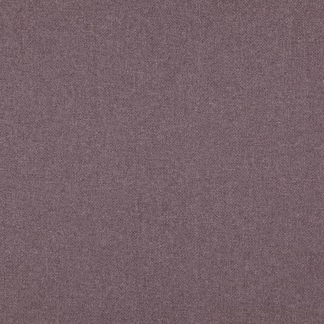 Close-up of dusty amethyst mauve fabric with a fine softly mottled weave