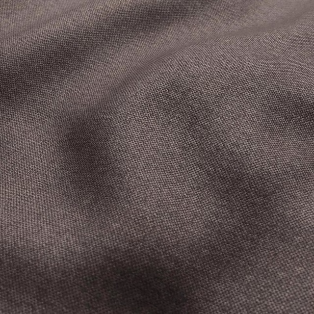 Close-up of chocolate-brown woven fabric with taupe mottling and soft surface depth