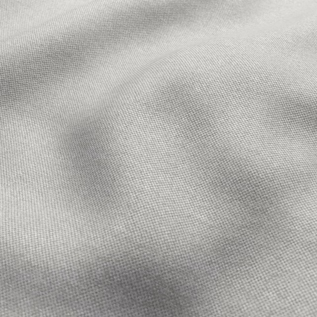 Soft grey micro-woven texture with subtle diagonal movement and shaded depth