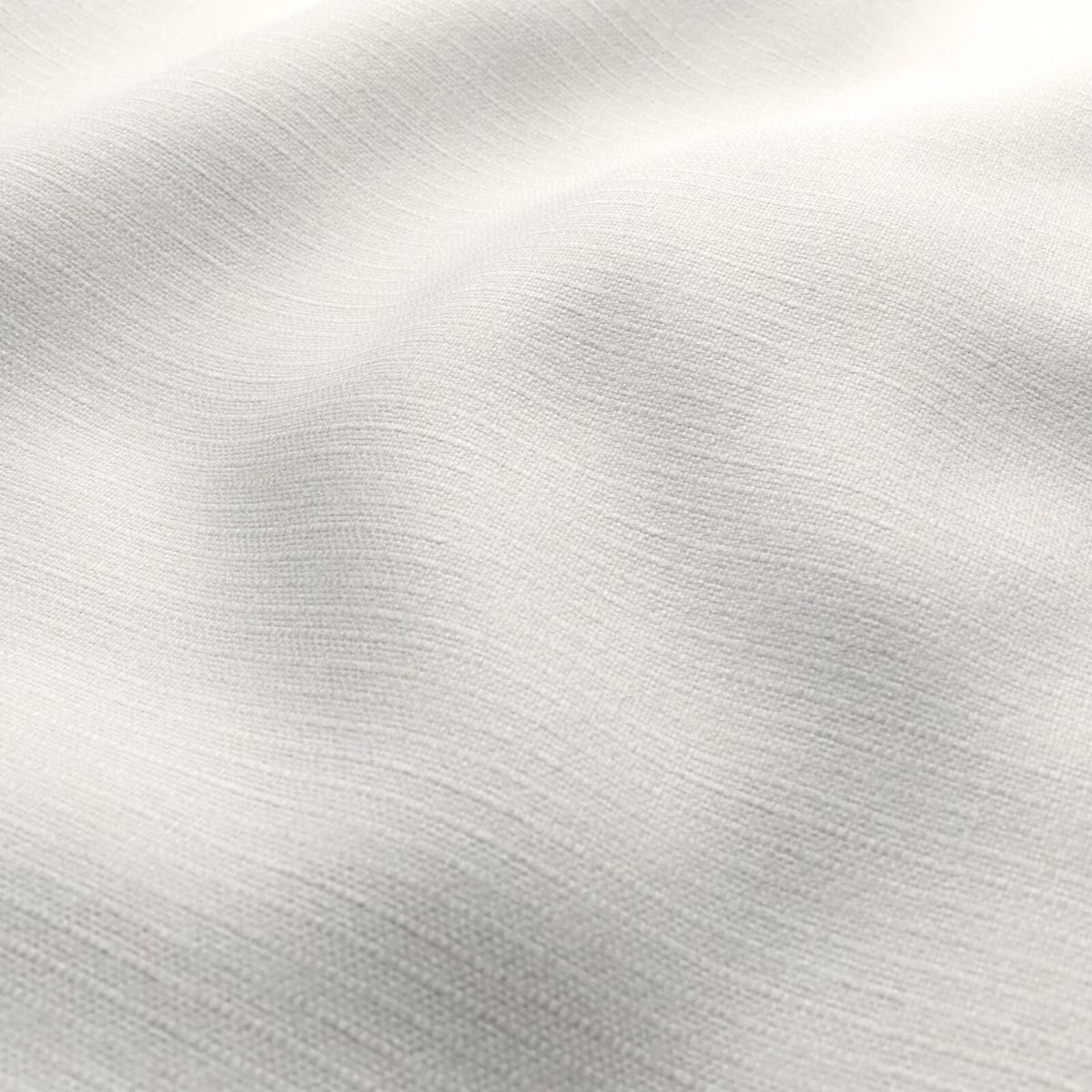 Pale opal ivory fabric with fine horizontal weave and a gentle silvery sheen