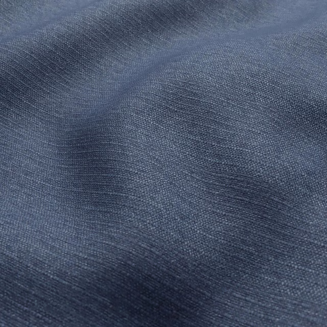 Close-up of deep blue-grey weave with soft, rippling tonal bands