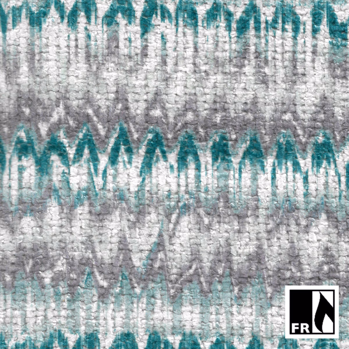 Cool teal zigzag bands over a nubby pale grey woven ground