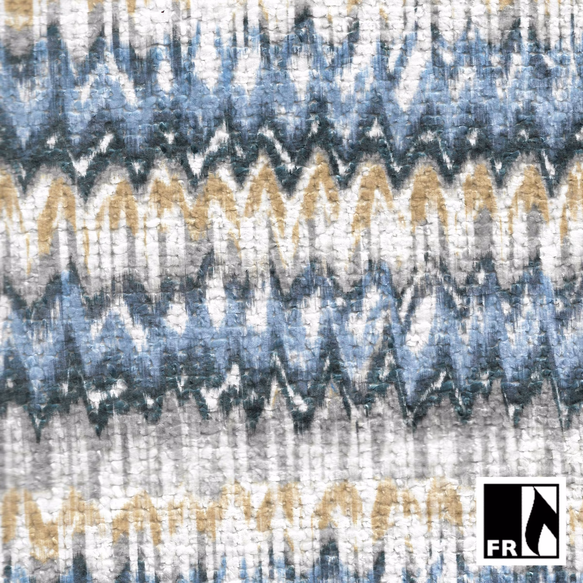Close-up of Iskat 04 Denim with denim blue zigzags, chalk white and ochre woven texture