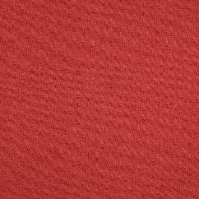 Close view of finely woven strawberry-red fabric with subtle tonal mottling
