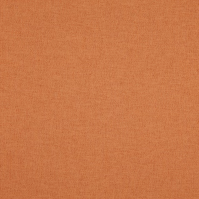 Close-up of warm pumpkin-orange Isla fabric with a fine, subtly grainy weave
