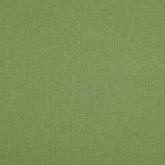 Close-up of muted meadow-green fabric with a fine, subtly irregular woven texture
