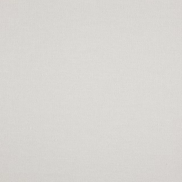 Pale warm calico fabric with a barely visible fine woven surface