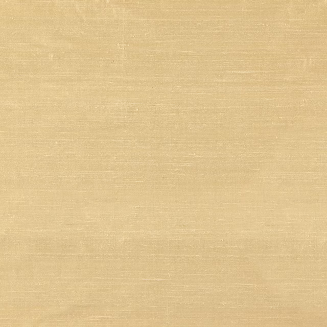Warm buttermilk plain weave with fine horizontal slubs and a soft sheen