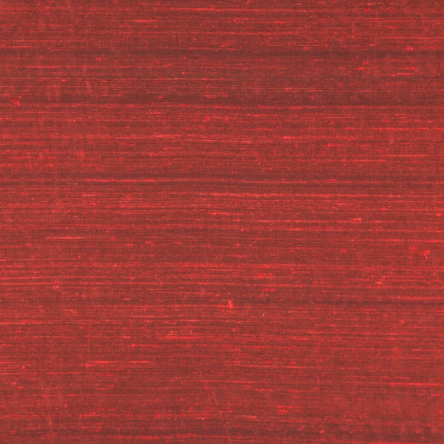 Deep cherry-red textile with fine horizontal striations and a subtle lustrous sheen