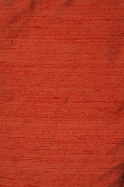 Warm russet-red textile with fine horizontal striations and a gentle sheen