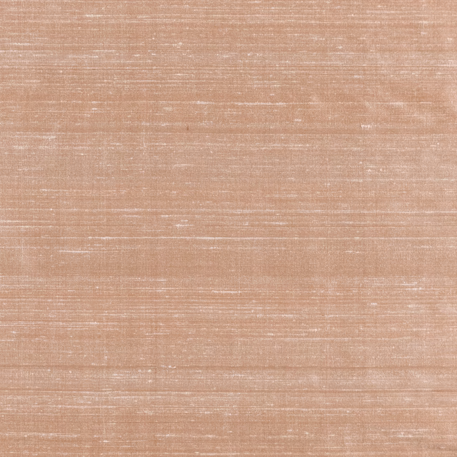 Warm blush-pink woven swatch with fine horizontal slubs and a soft sheen