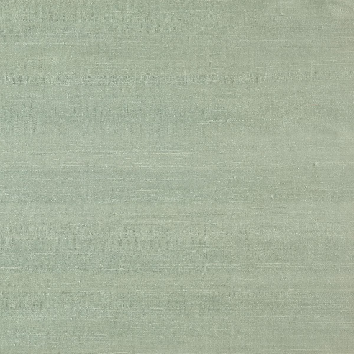 Soft sage-green woven swatch with fine horizontal slubs and a gently brushed surface