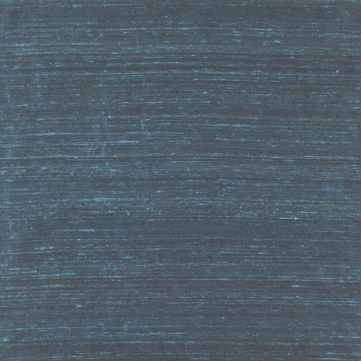 Deep sapphire blue-grey fabric with fine horizontal teal strié and subtle lustre