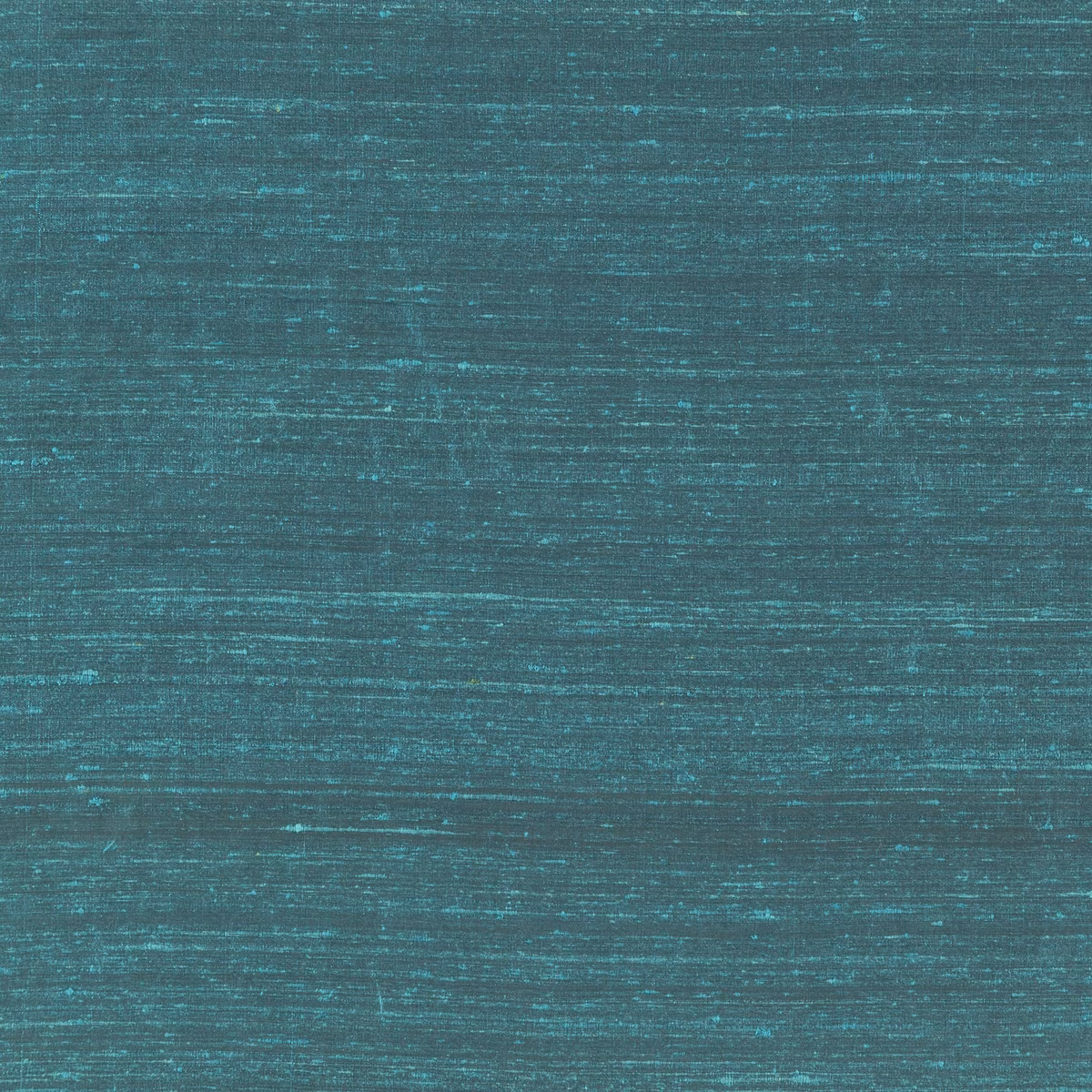 Close-up of cobalt teal fabric with fine horizontal striations and slub texture