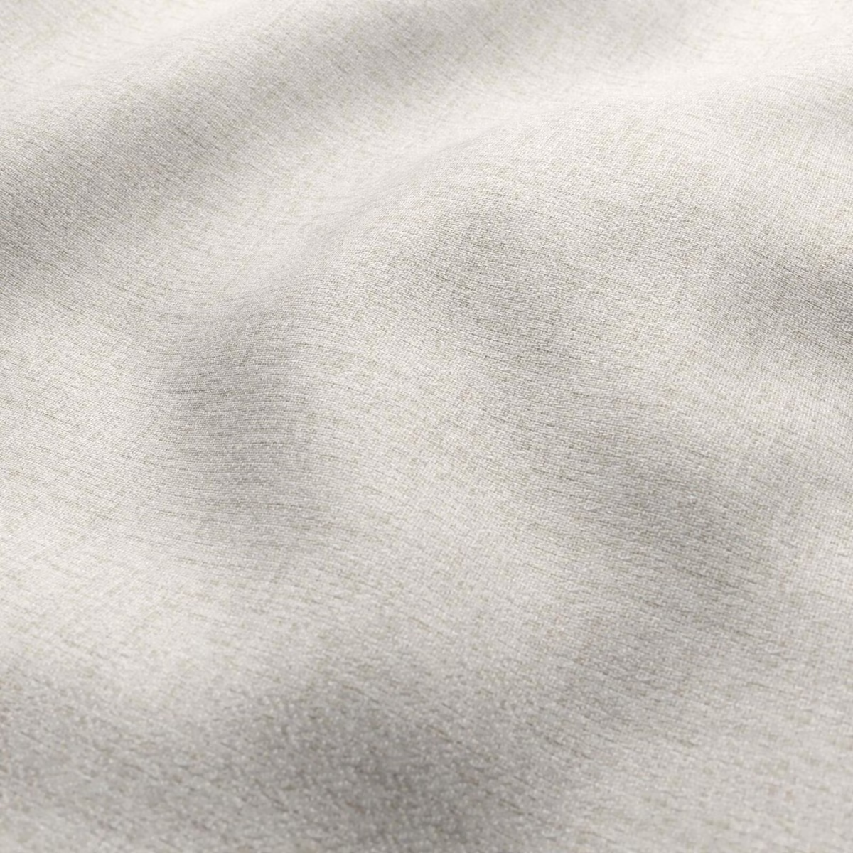 Pale warm taupe woven fabric with soft mottled shading and fine texture