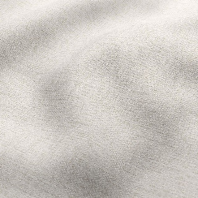 Pale warm taupe woven fabric with soft mottled shading and fine texture