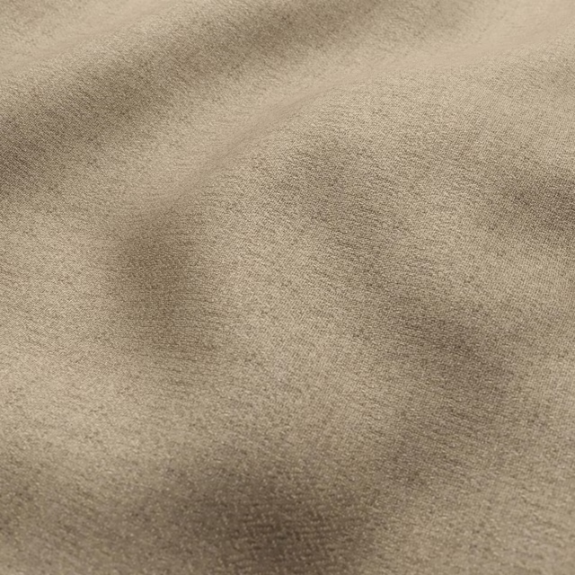 Close-up of warm taupe fabric showing a fine, softly tonal woven surface