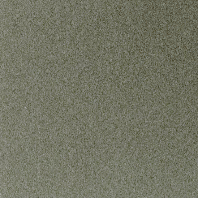 Close-up of muted matcha-green fabric with a dense, softly brushed tonal surface