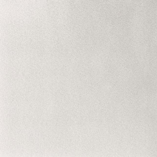 Close-up of softly mottled ivory fabric with a fine, even woven texture