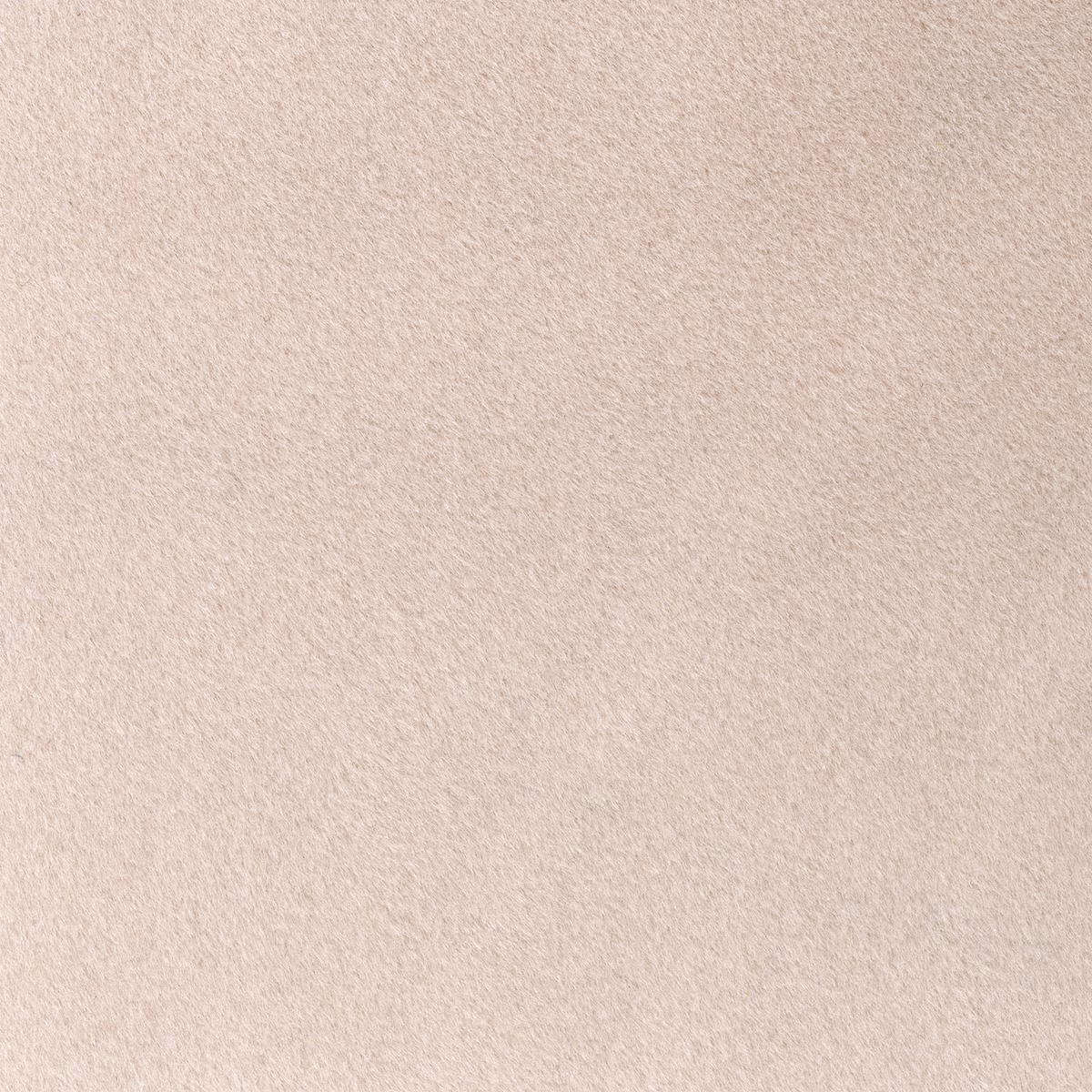 Pale ballet-pink fabric with a softly brushed, subtly mottled plush surface