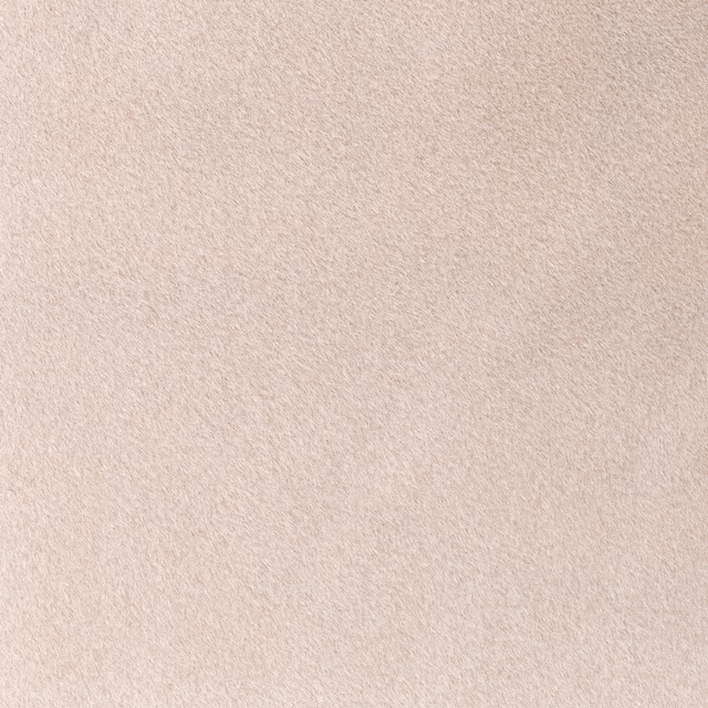 Pale ballet-pink fabric with a softly brushed, subtly mottled plush surface
