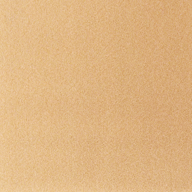 Warm sunflower-gold fabric with a fine, softly mottled surface texture