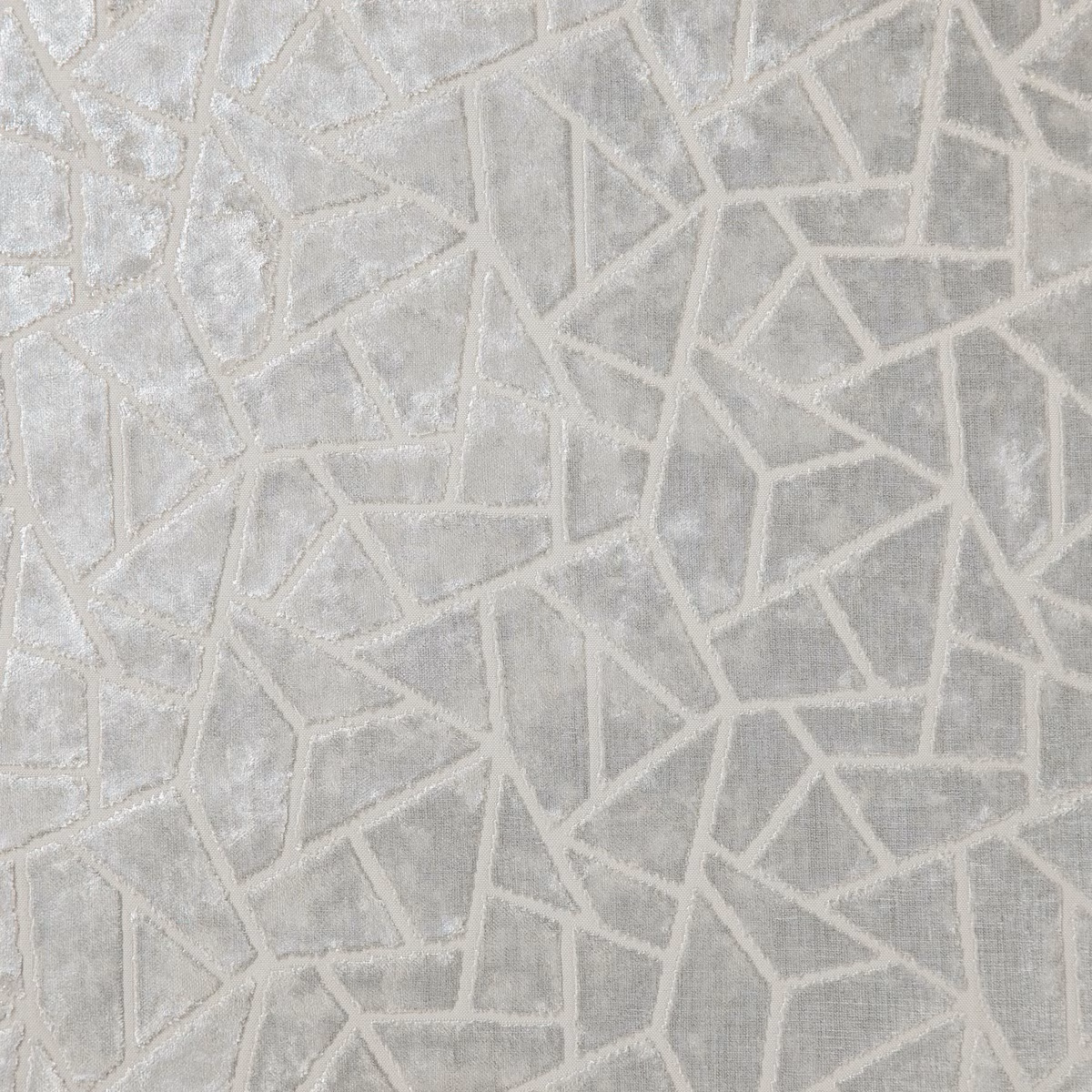 Pale ivory-grey woven fabric with raised angular fracture lines and soft sheen
